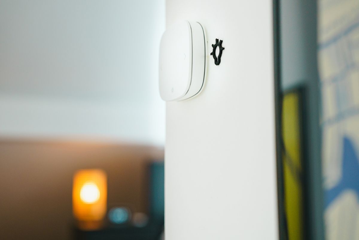 Smart wall switch installed on a clean interior wall